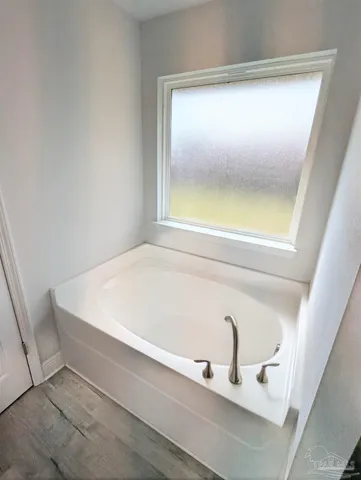 a bathroom with a bathtub
