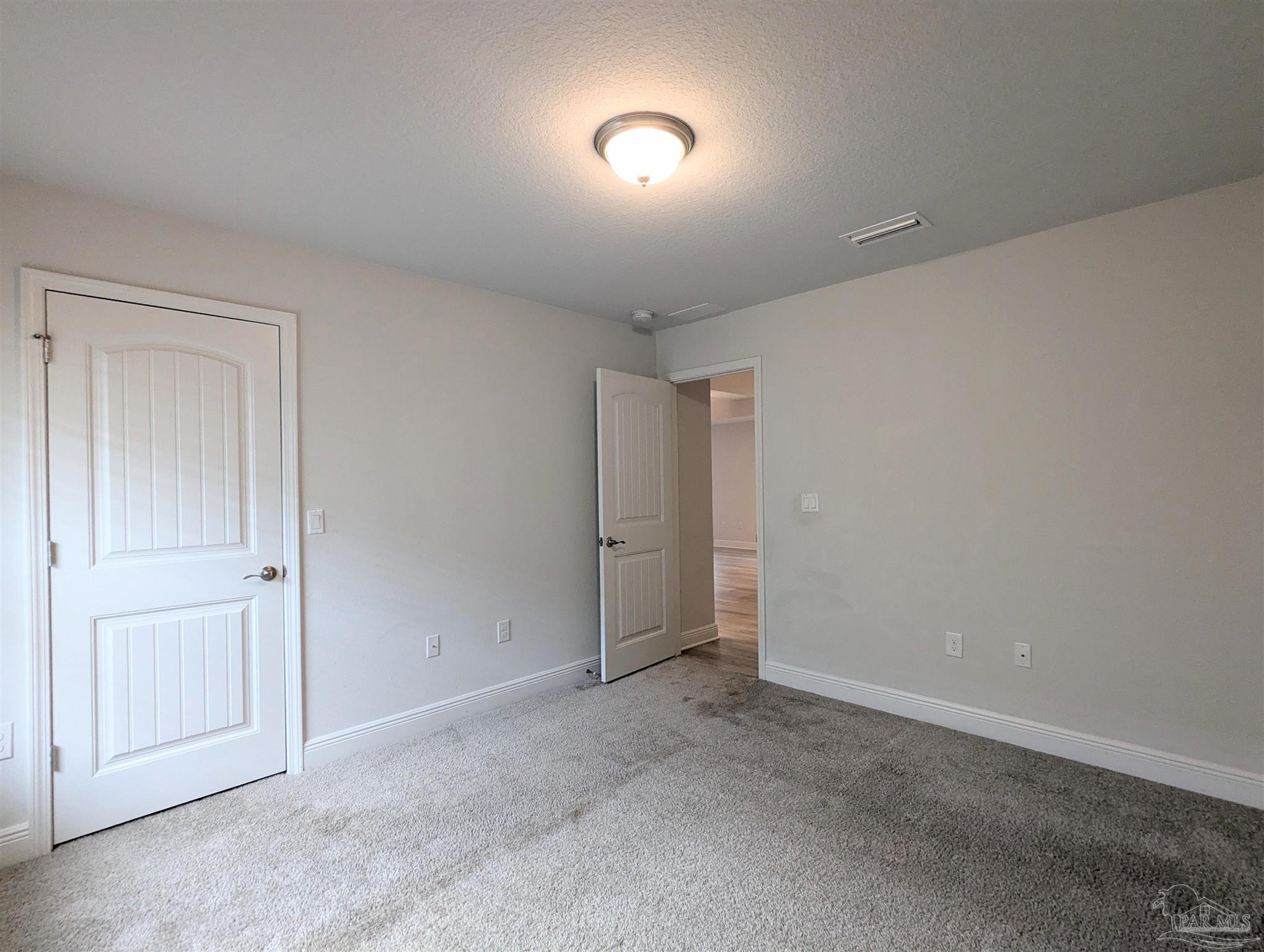 4723 Frances Street Pace, FL 32571 - Photo 29 of 41 a view of an empty room