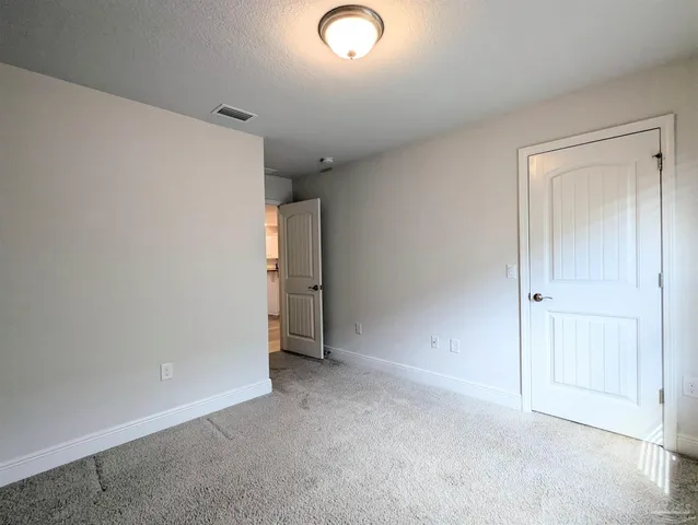 an empty room with an entryway
