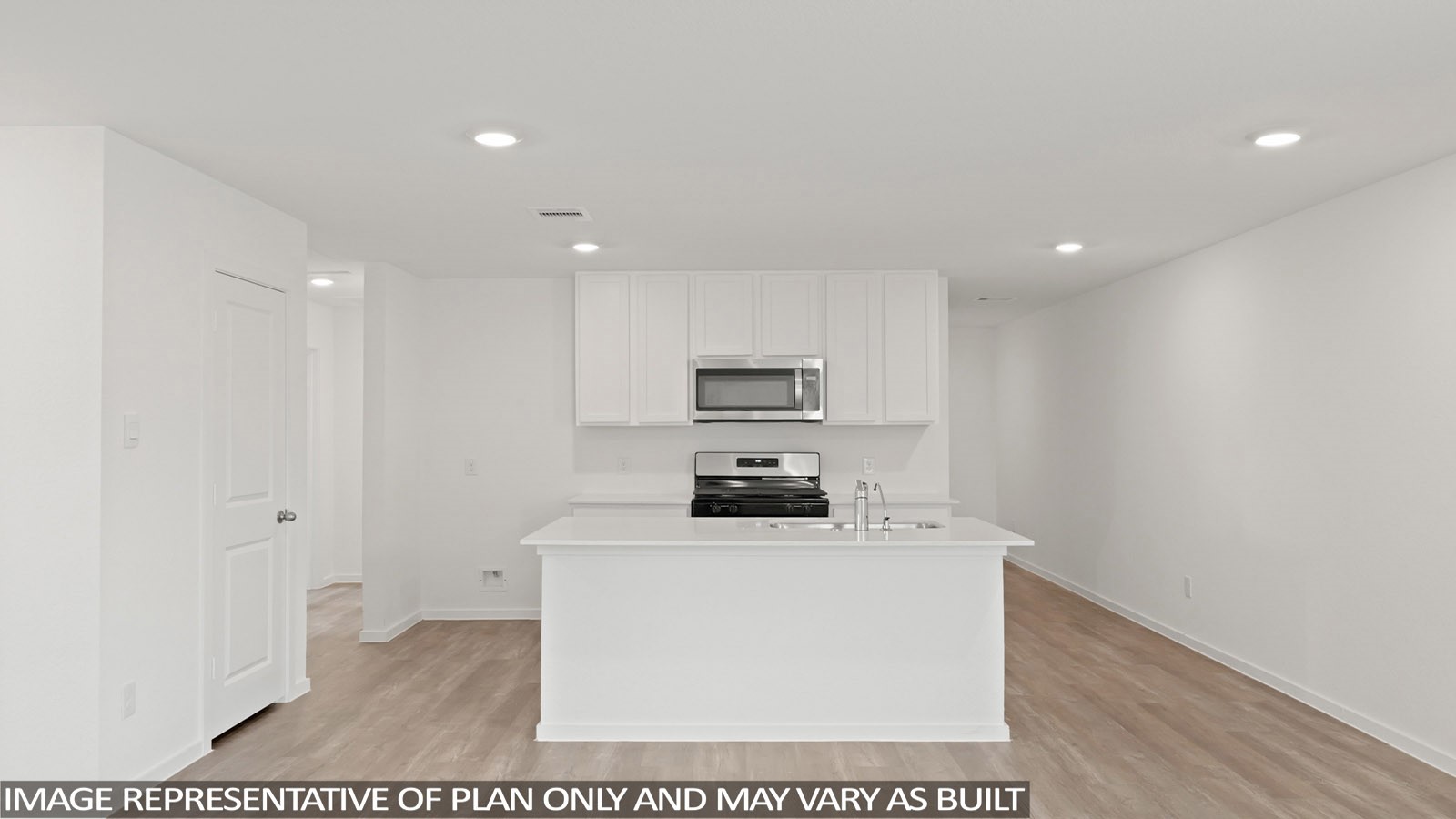 965 Sutherland Falls Street Conroe, TX 77303 - Photo 6 of 35 a kitchen with a sink stainless steel appliances and cabinets
