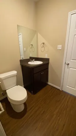 a bathroom with a toilet and a sink