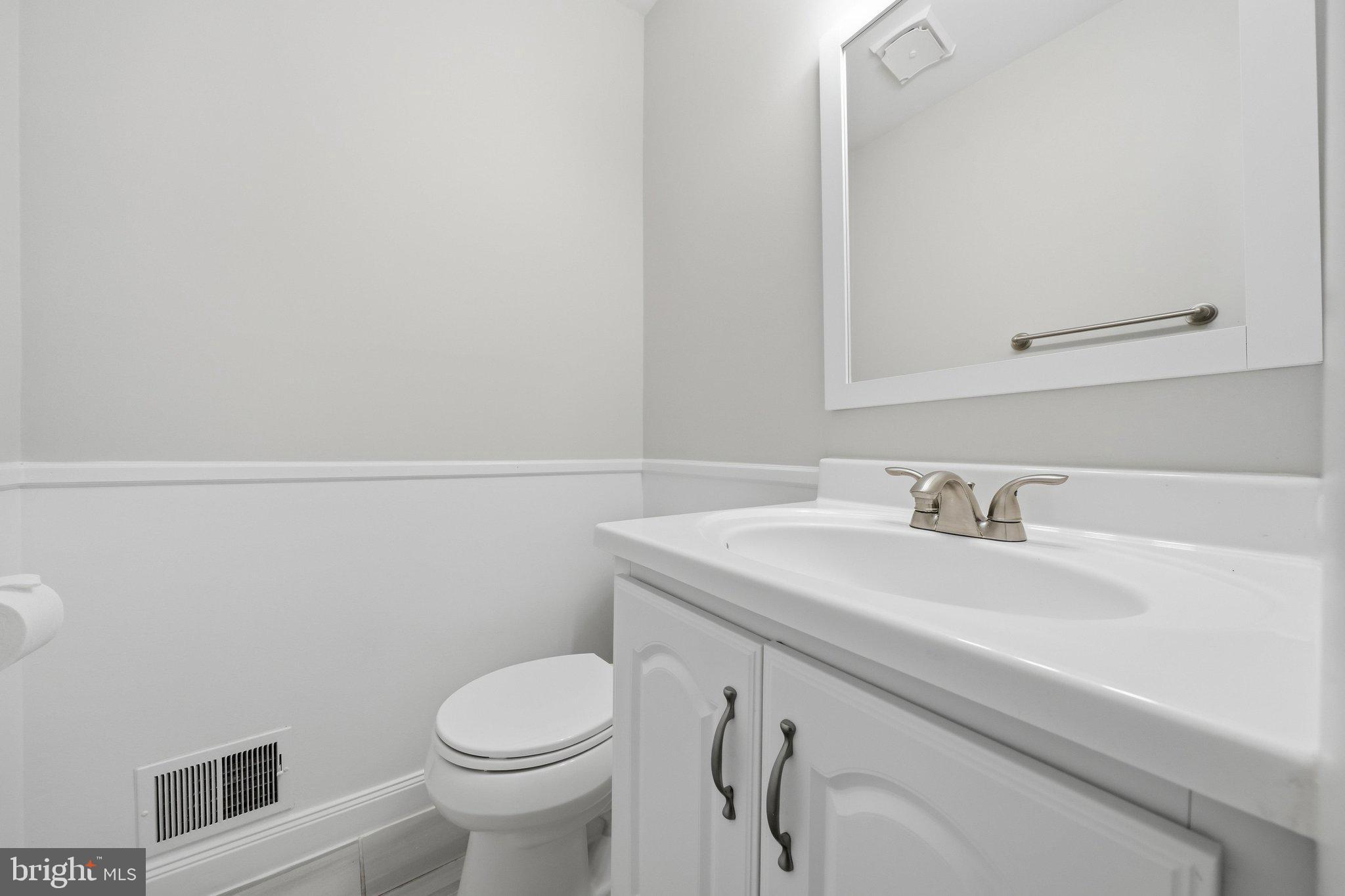 14317 Sturtevant Road Silver Spring, MD 20905 - Photo 22 of 55 Main Level Powder Room