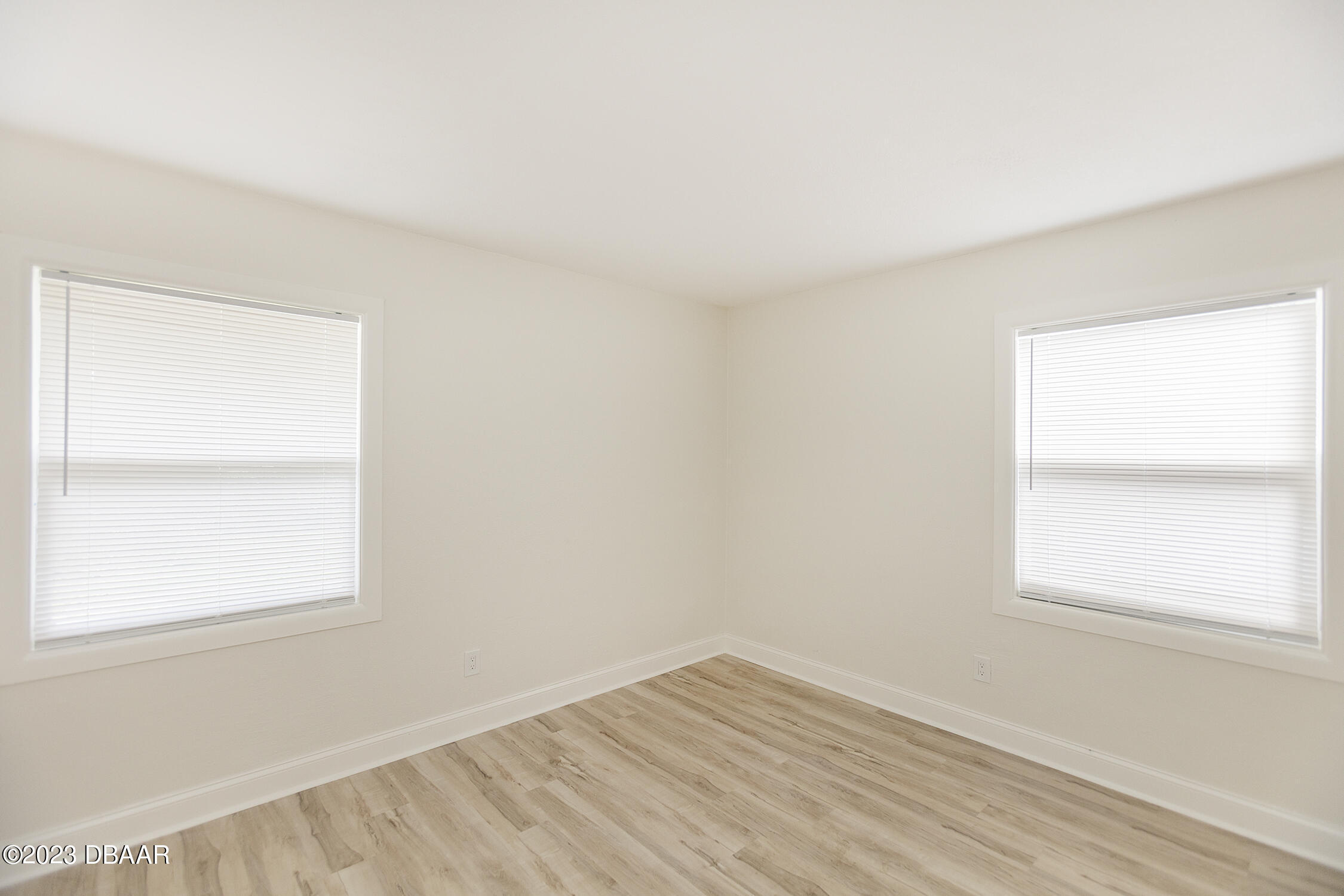 489 Wiltshire Boulevard Port Orange, FL 32127 - Photo 32 of 40 an empty room with a window