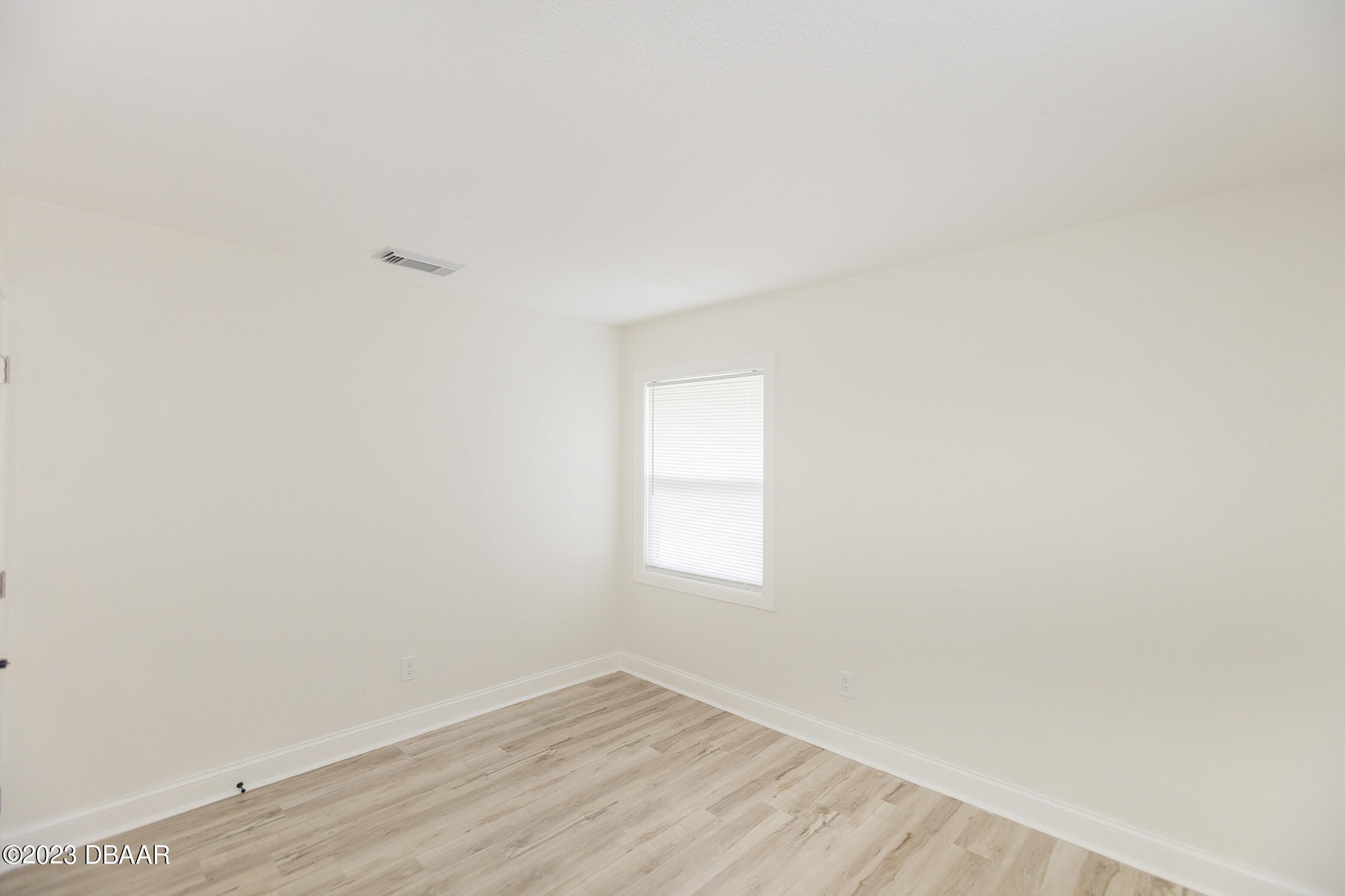 489 Wiltshire Boulevard Port Orange, FL 32127 - Photo 34 of 40 a view of an empty room and window