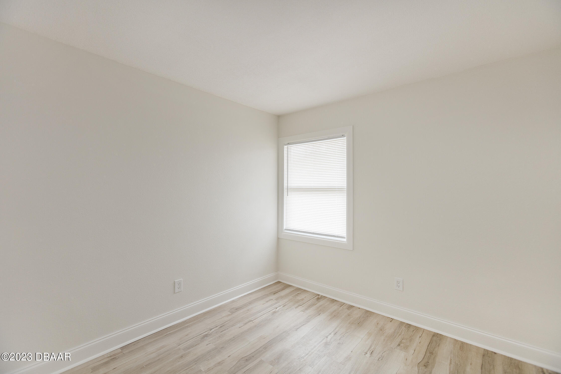 489 Wiltshire Boulevard Port Orange, FL 32127 - Photo 35 of 40 an empty room with a window