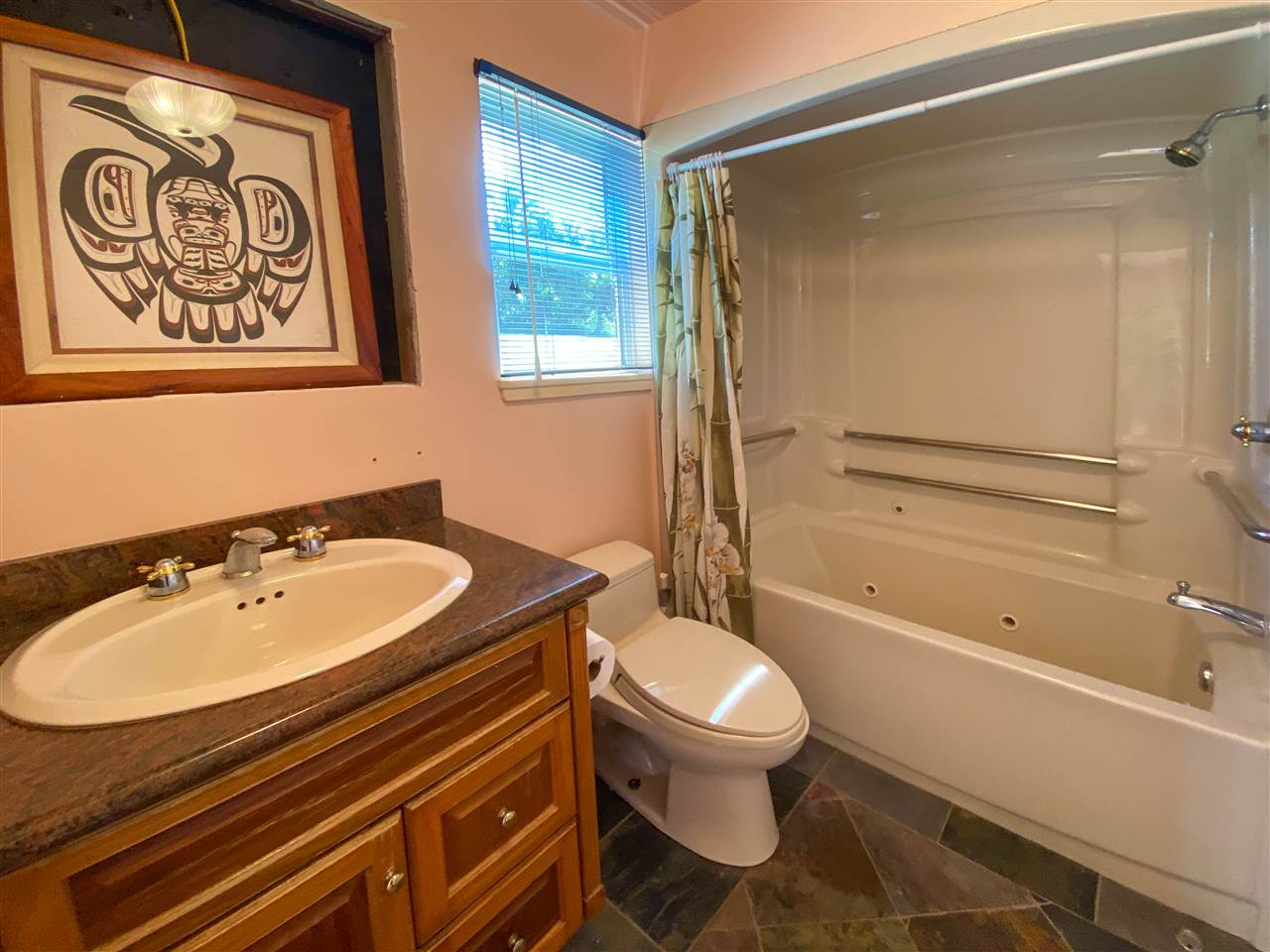 65 Door Of Faith Road Haiku, HI 96708 - Photo 23 of 30 a bathroom with a sink a toilet and shower