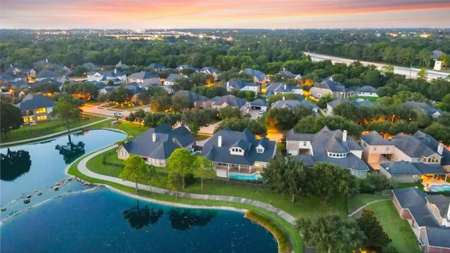 an aerial view of residential house with outdoor space