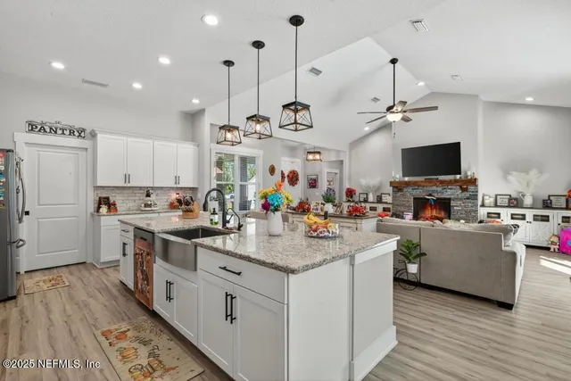 a bedroom with a bed dresser and a window