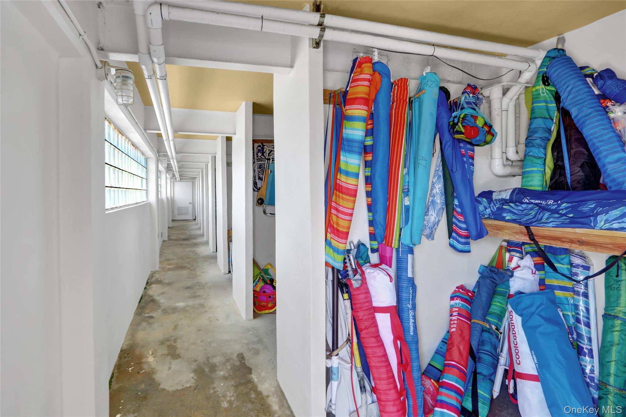 700 Shore Road, Unit 4K Long Beach, NY 11561 - Photo 31 of 31 a view of a closet with storage