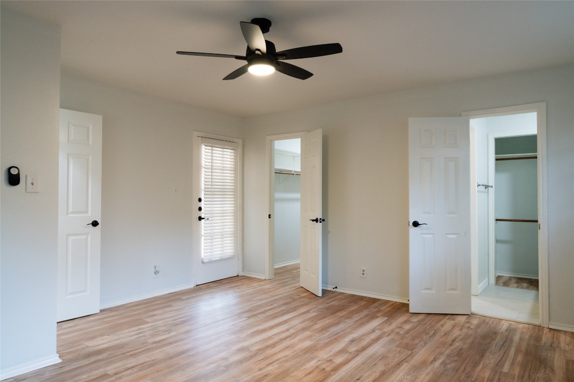 13002 Cedarhurst Circle Austin, TX 78729 - Photo 32 of 40 wooden floor in an empty room with a window