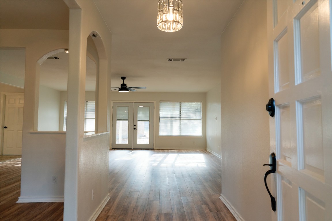 13002 Cedarhurst Circle Austin, TX 78729 - Photo 8 of 40 a view of entryway with wooden floor