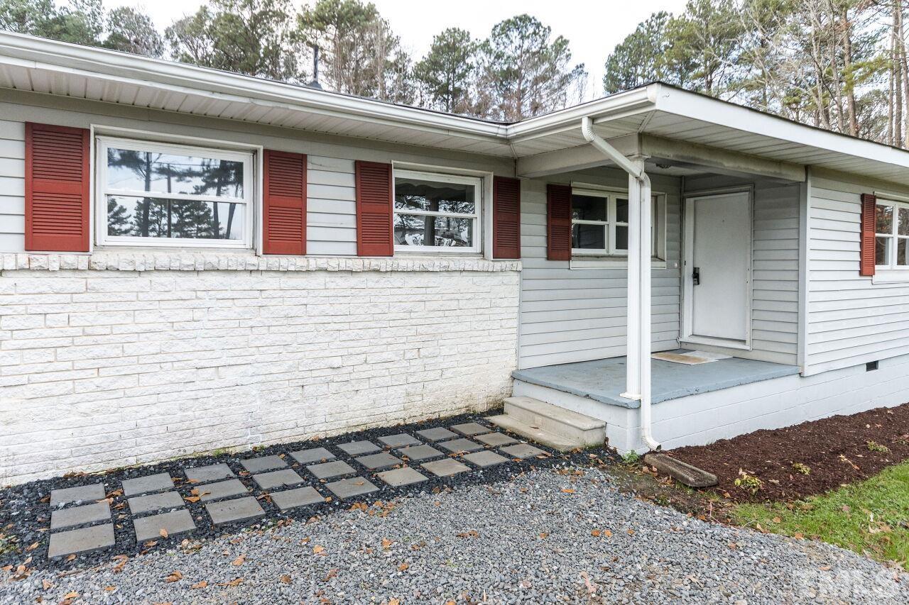 1309 Legend Road Raleigh, NC 27603 - Photo 3 of 27 a view of house with door