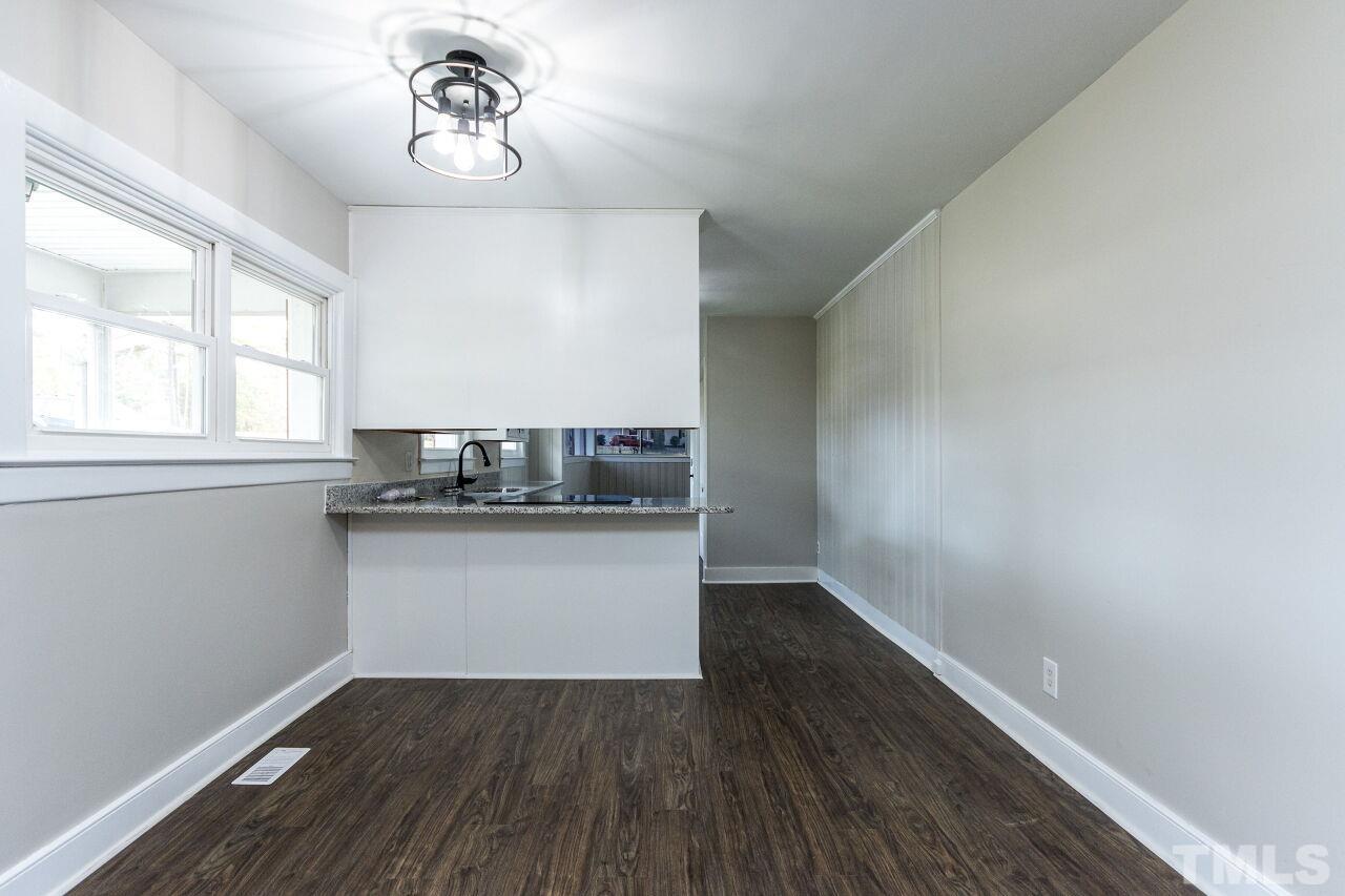 1309 Legend Road Raleigh, NC 27603 - Photo 9 of 27 a view of kitchen and sink