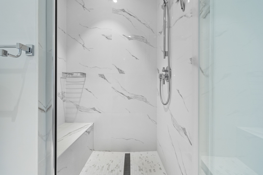 69 Walnut Street, Unit 10A Brookline, MA 02445 - Photo 15 of 17 a bathroom with a shower
