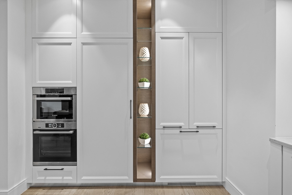 69 Walnut Street, Unit 10A Brookline, MA 02445 - Photo 8 of 17 a view of a kitchen with appliances