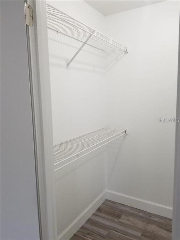 236 Afton Square, Unit 201 Altamonte Springs, FL 32714 - Photo 19 of 42 a view of an empty walk in closet