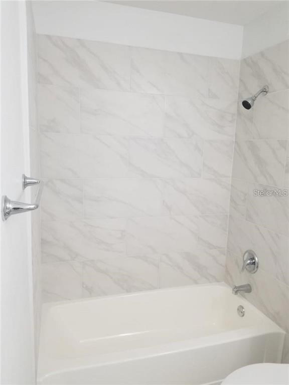 236 Afton Square, Unit 201 Altamonte Springs, FL 32714 - Photo 21 of 42 a bathroom with a bathtub