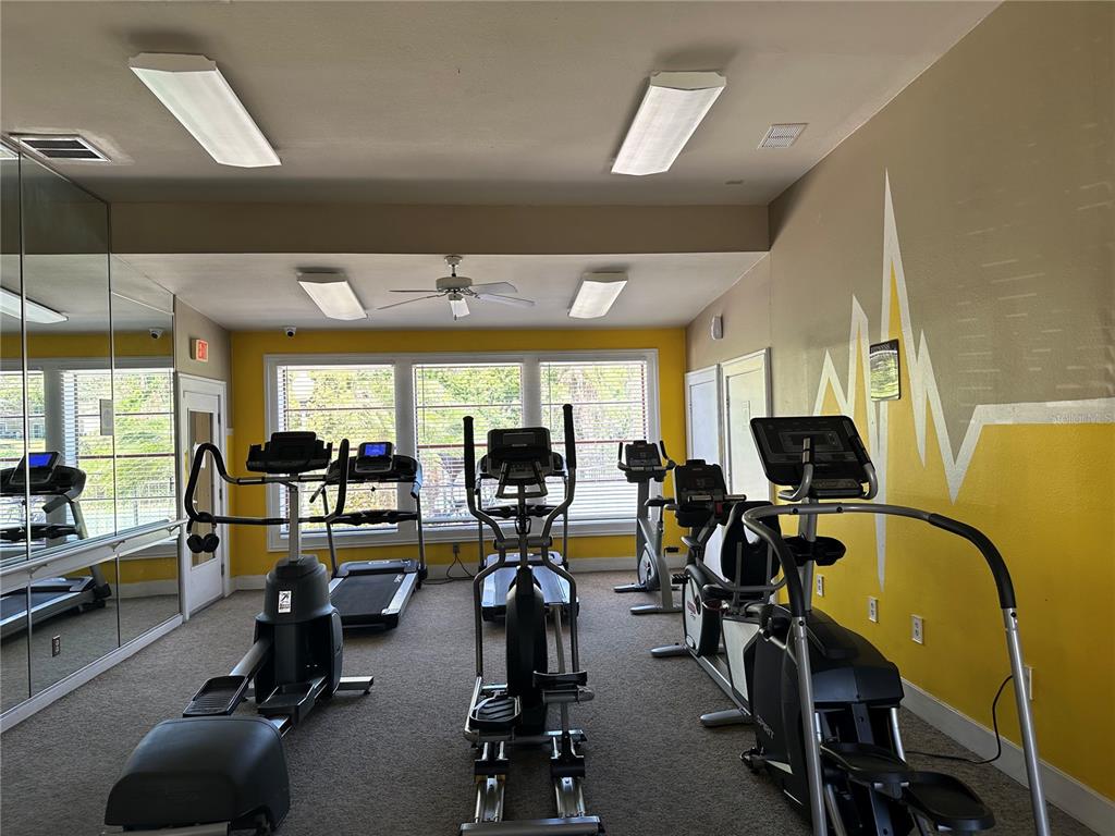 236 Afton Square, Unit 201 Altamonte Springs, FL 32714 - Photo 30 of 42 a view of a room with gym equipment