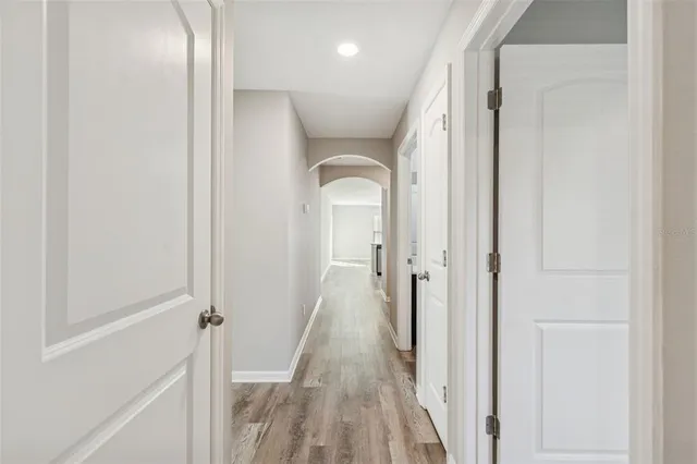 a bathroom with a sink a toilet a tub and shower