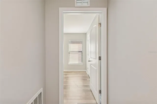 a view of a room with racks on the wall