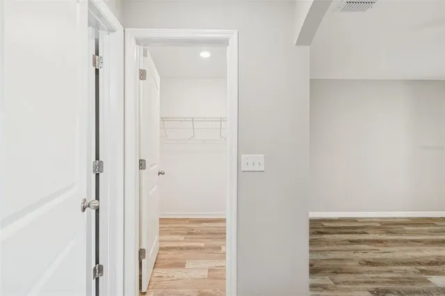 a kitchen with stainless steel appliances a stove and a refrigerator