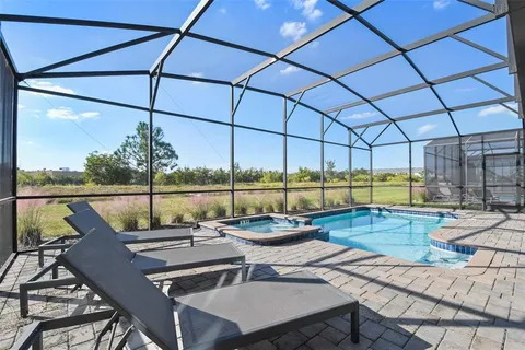 a kitchen with a refrigerator sink and microwave