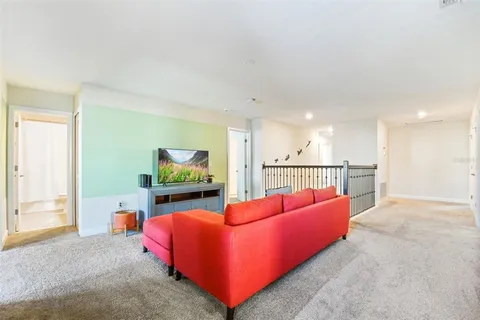 a living room with furniture and a table