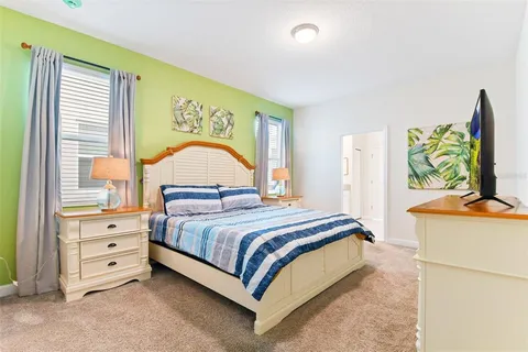 a bathroom with a shower and a sink