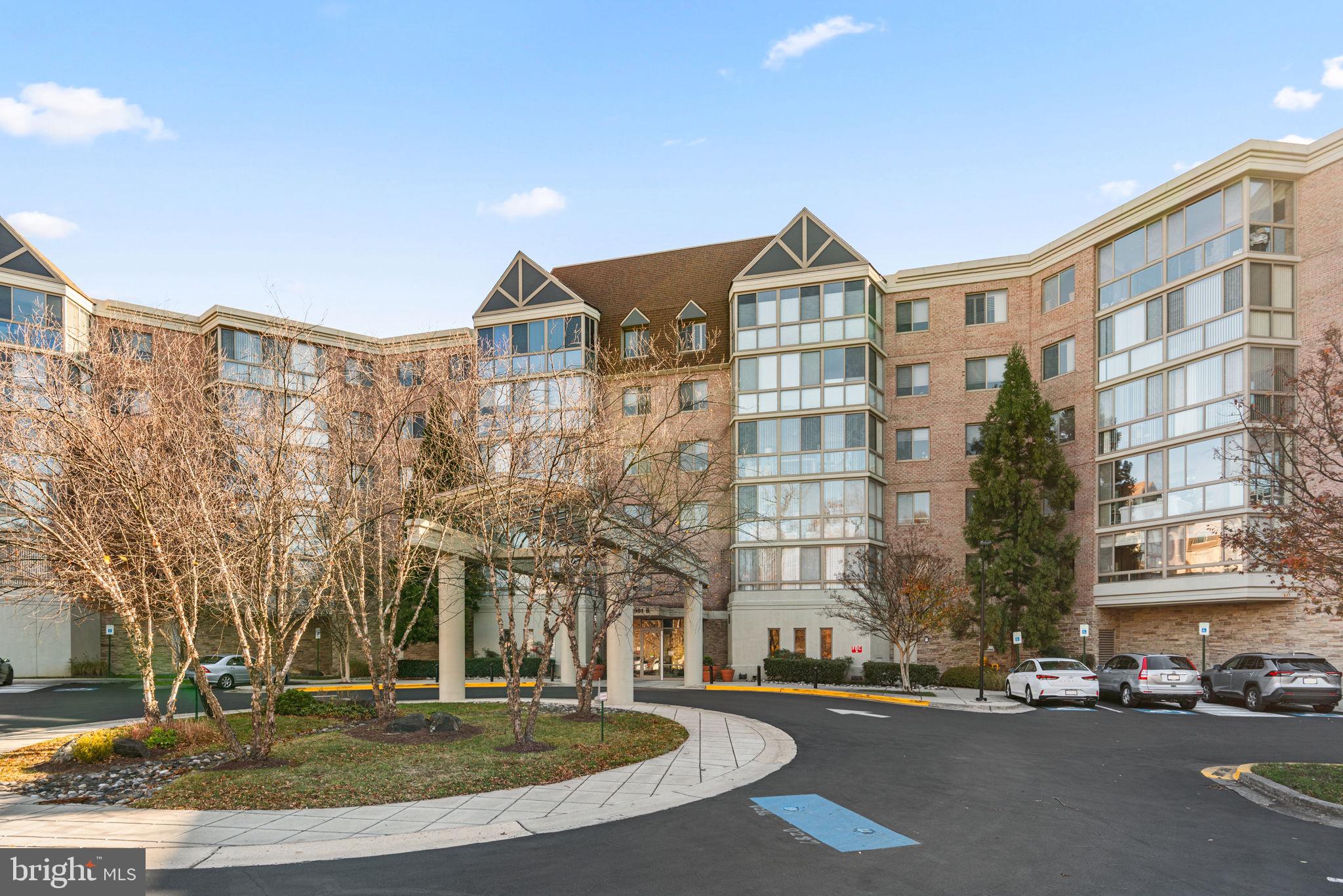 2901 South Leisure World Boulevard, Unit 233 Silver Spring, MD 20906 - Photo 2 of 44 a front view of a building