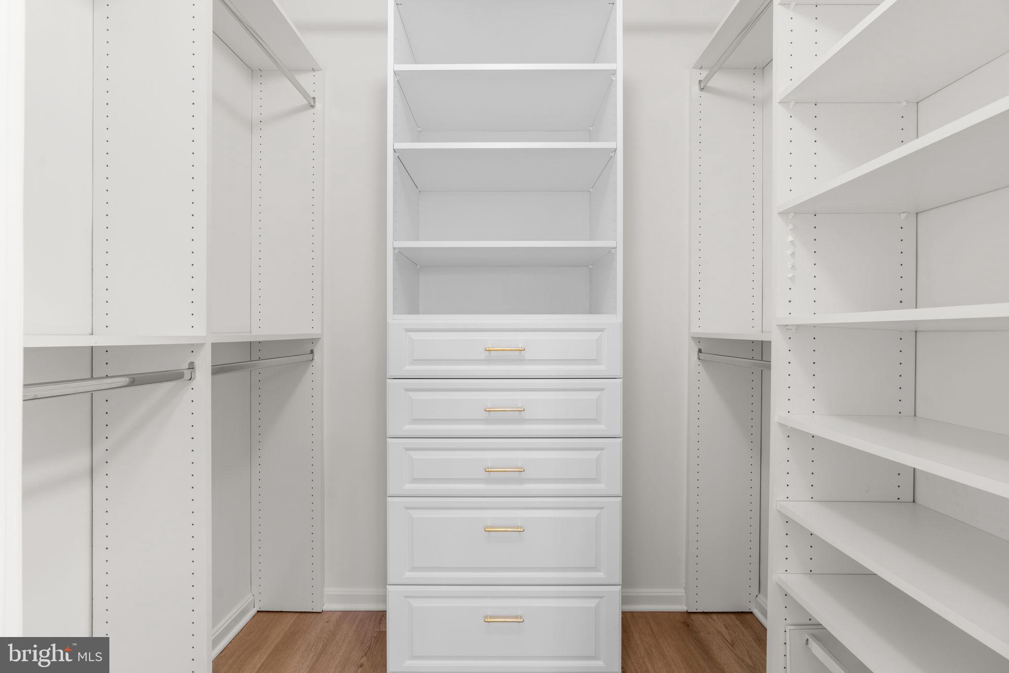 2901 South Leisure World Boulevard, Unit 233 Silver Spring, MD 20906 - Photo 24 of 43 a view of walk in closet with empty racks