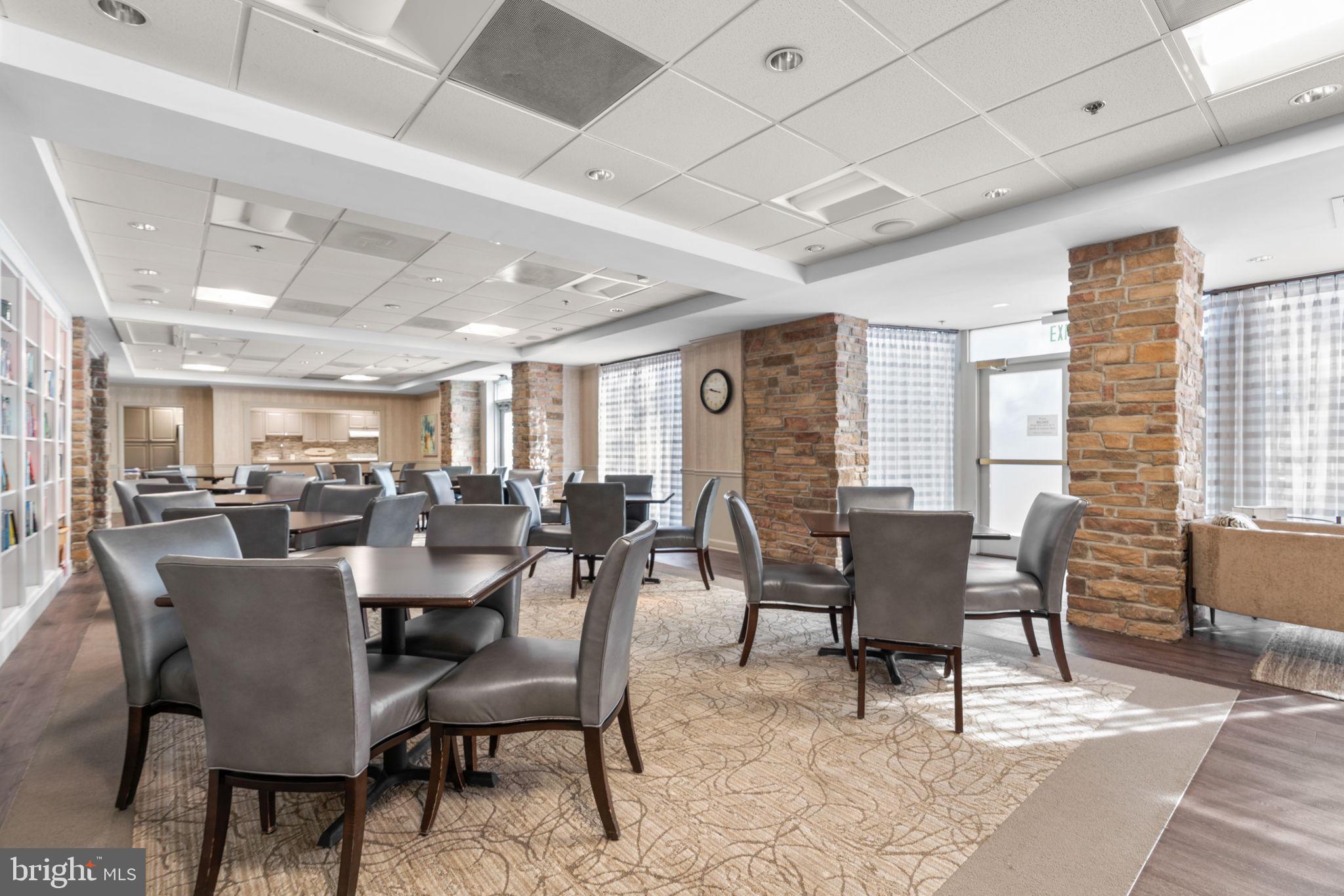2901 South Leisure World Boulevard, Unit 233 Silver Spring, MD 20906 - Photo 34 of 44 a view of a dining room with furniture