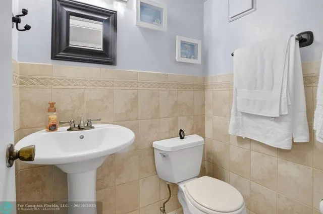 an aerial view of a house with a garden