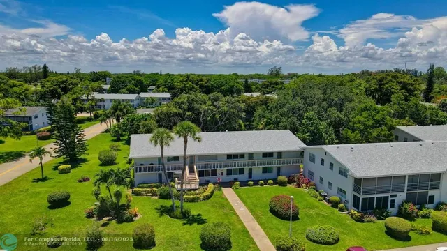 aerial view of a house with a swimming pool