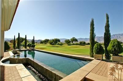 184 Loch Lomond Road Rancho Mirage, CA 92270 - Photo 1 of 13 a view of a patio with swimming pool
