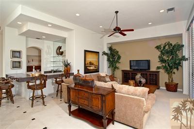184 Loch Lomond Road Rancho Mirage, CA 92270 - Photo 4 of 13 a living room with fireplace furniture and a flat screen tv