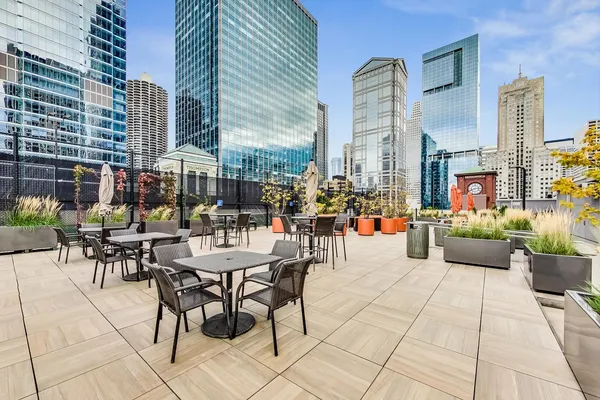a outdoor space with lots of tables and chairs