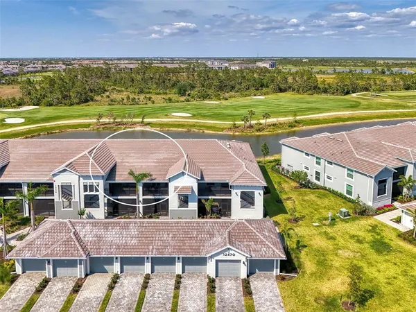 a aerial view of a house with a big yard