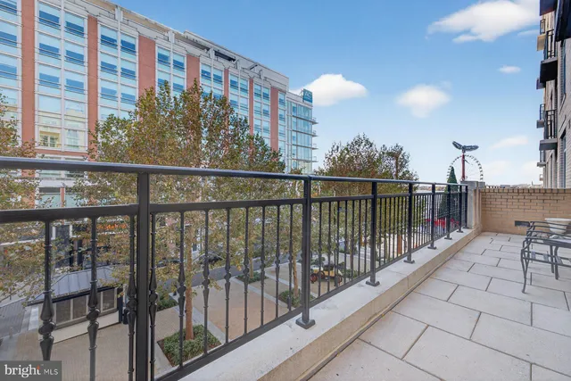 a view of a balcony with furniture