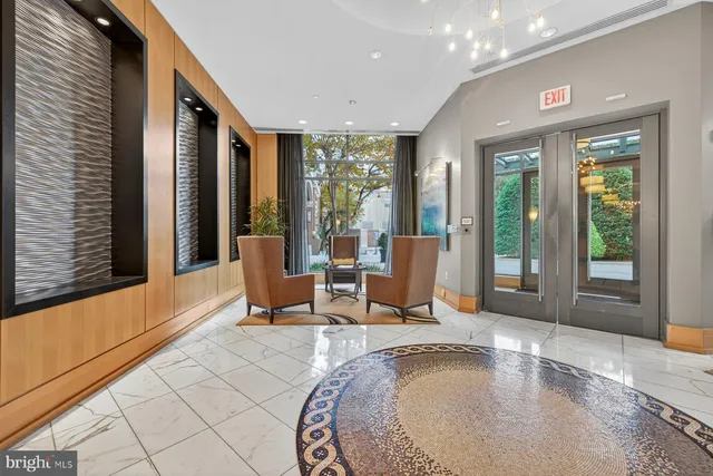 a view of a living room and a large window