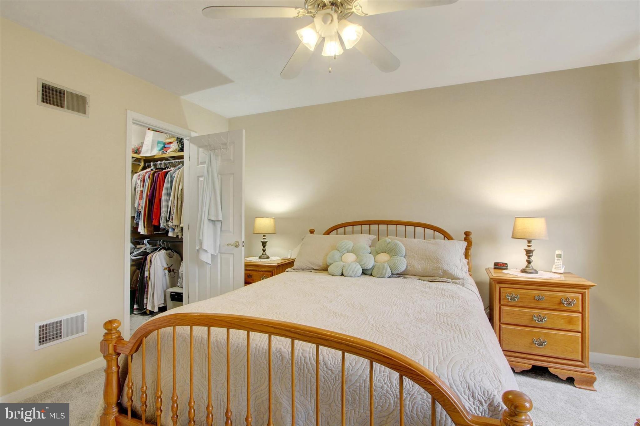 975 Hoffman Home Road Gettysburg, PA 17325 - Photo 19 of 28 a bedroom with a bed and a chandelier