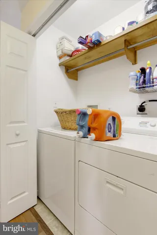 a utility room with dryer and washer