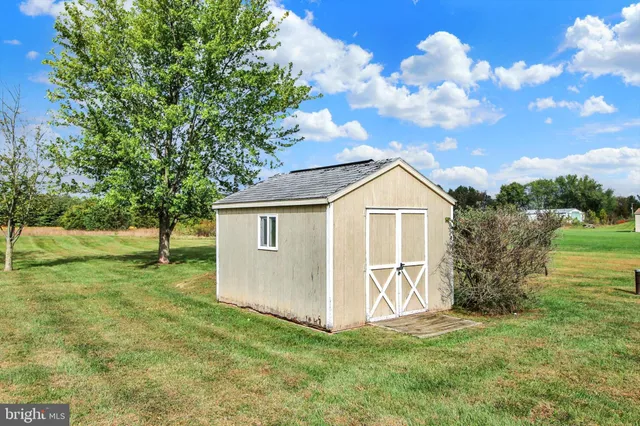 a view of a backyard with a garden