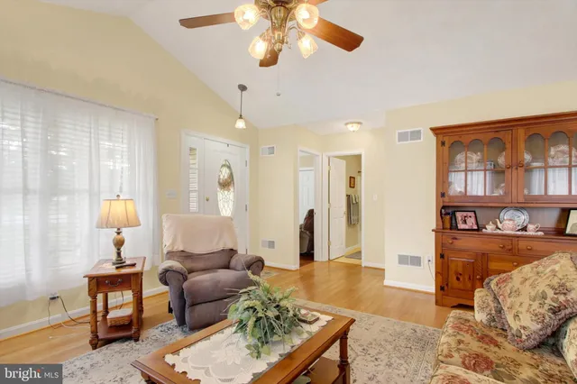 a living room with furniture and a couch