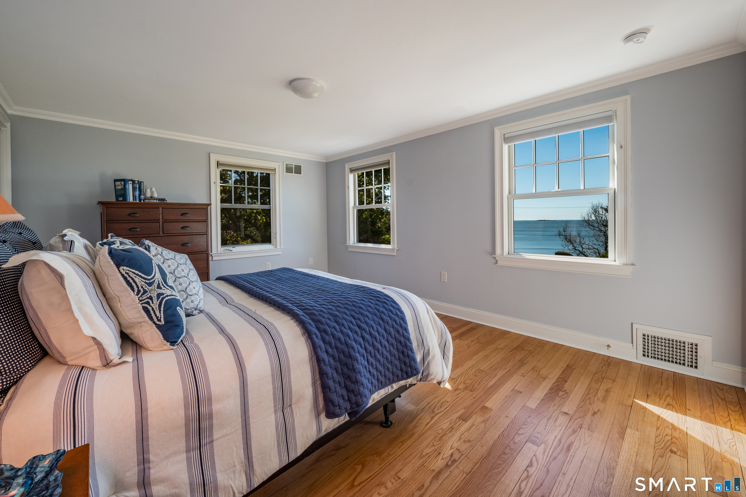 28 Walden Hill Road Guilford, CT 06437 - Photo 21 of 35 a bedroom with bed and wooden floor
