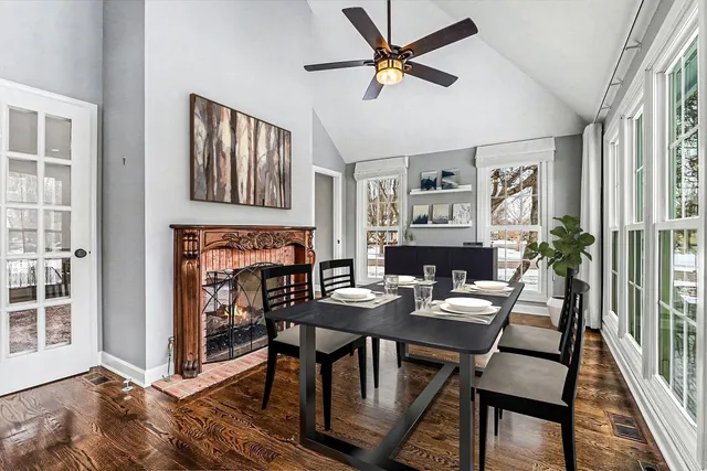 a view of a livingroom with furniture and a fireplace