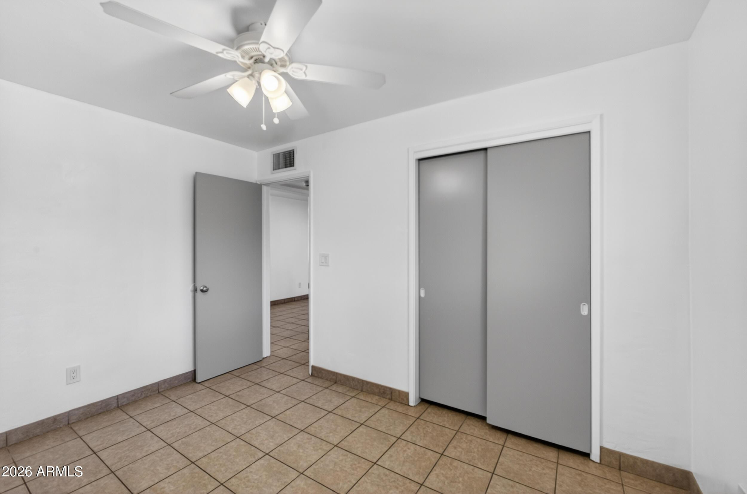 446 South Bellview Mesa, AZ 85204 - Photo 17 of 19 a view of a chandelier fan and entryway