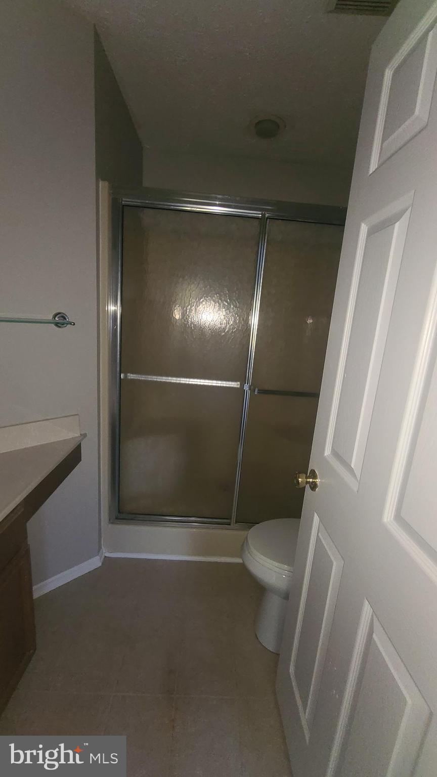 49 Bridle Lane, Unit 55 Nottingham, MD 21236 - Photo 11 of 17 a bathroom with a sink and toilet