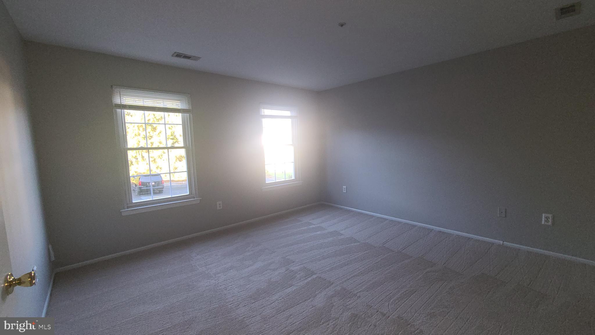 49 Bridle Lane, Unit 55 Nottingham, MD 21236 - Photo 9 of 17 an empty room with a window