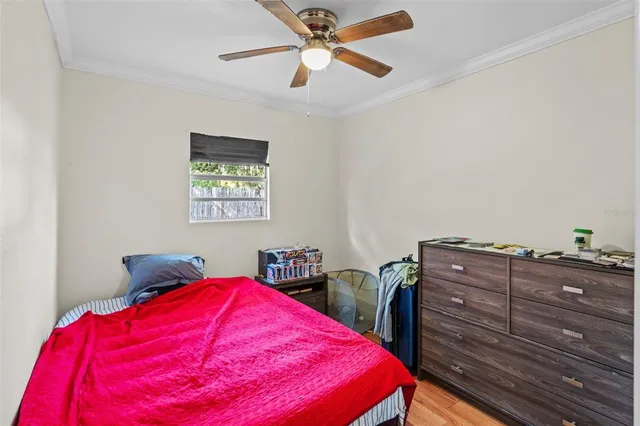 a bedroom with a bed and a closet