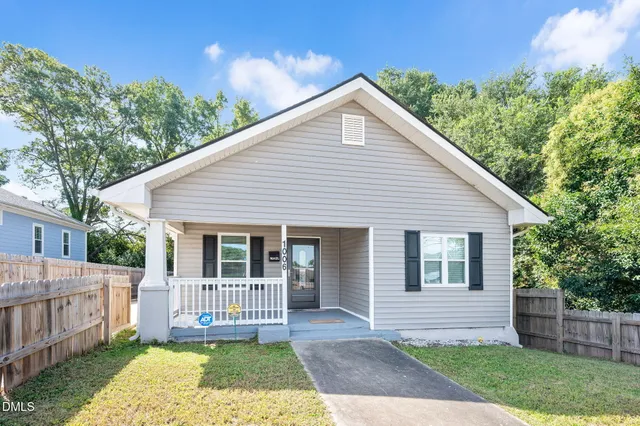 a picture of a bathroom with a shower